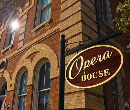 View of an historic building and Opera House sign